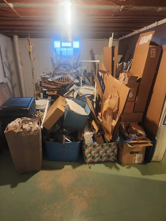 Roll-off dumpster container at job site for Yard Waste Dumpster Rental in West Tisbury